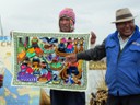 Local guide showing local needle work