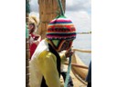 Uros child on read boat