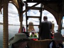 Small Uros child on reed boat